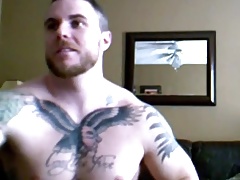 Tattooed dude wanking
