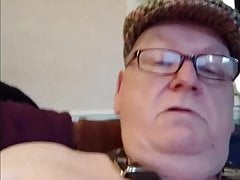 Flat cap Grampa tugs his todger