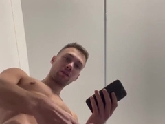 Amateur young fellow faps his huge spear in the douche and jizzes right on camera