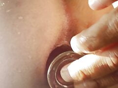 Fucked with anal plug on the beach