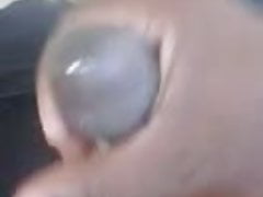 Masturbating