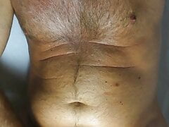Showing my hairy chest and hard cock