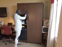 Wet and wild wetsuit action in a motel room