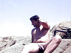 Masturbating on the beach