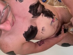 Muscular geek paints before jerking off and cumming on himself