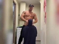 Bodybuilder muscle flexing while getting a blowjob