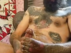 TATOO STUD SHOOTING HIS LOAD 1