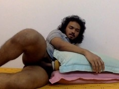 Guy fingers his ass while destroying his toy and blows a massive load