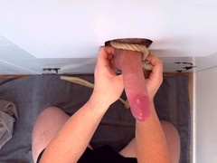 XXL monster cock gets tied up at the gloryhole for some hot action