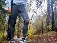 Rainy run in latex. See parent freeballing and flashing off my bulbous dickprint in the rain