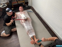 Playfully Endulging A Mummified Pup