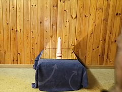 Riding a double dildo