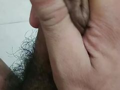 Young boy playing with dick
