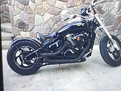 REDHEAD THAT HAS LARGE TITS IS GETTING FUCKED ON THE BIKE