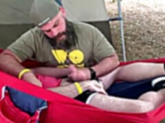 fellating a fellow in a hammock