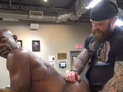 Black lover gets ass rammed by a bearded trucker with a huge cock
