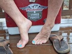 Naked masculine feet in flip flops with nicely pedicured toes from Tnfootlvr
