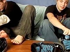 Naughty twinks tease with their feet and jerk off together