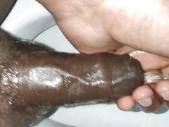 Touching and playing with my indian black big cock and peeing in toilet and them cum and cumshot play