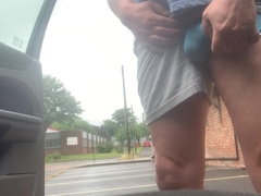 Pissing and pop-shot on a carpark