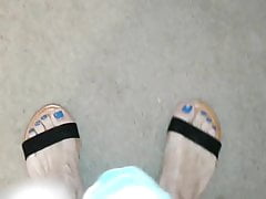 Blue toes in sandals