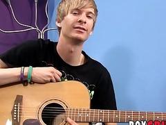 Blond twink plays the guitar before stripping and jerking off