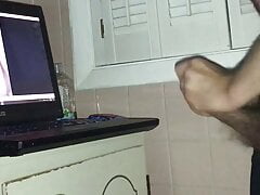 Standing and jerking to hot fingering in the bathroom