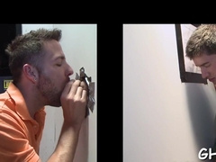 Enjoying gloryhole oral fuck