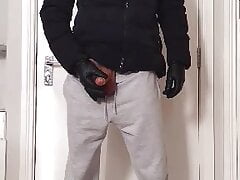 Dude jerks off a dick in gloves