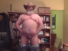 Cowboy stroking his cock