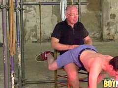 youthful twunk slave Bob Steel receives booty spanking by old dom