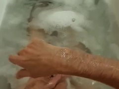 Draining in the Tub in Bathing Suit