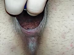 Closeup anal gaping with a bottle