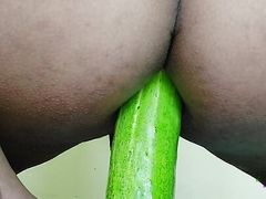 Sissy playing with cucumber and getting her ass ready for big cock