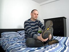 Kudoslong stripping naked shows his shaved semi-erect cock as he wanks becomes erect