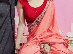 Hot Indian bhabhi in red saree gets seduced in a corner