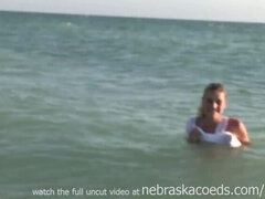 tiny skinny blonde from st pete florida illegally naked on the beach
