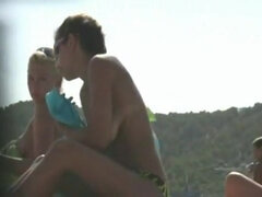 Big tits on the beach in this beach cam video compilation