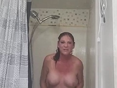 Take a long hot shower with a sexy real amateur MILF while I masturbate and squirt