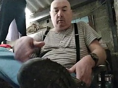 Dad Marcels feet smell bad in his garage-office