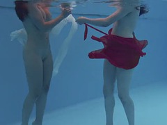 Anastasia Ocean and Marfa are naked underwater