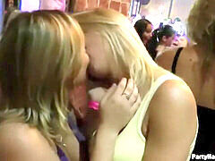 Hot girls passionately kissing with tongues at a wild party