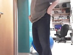 guy pees himself while waiting for bathroom at work