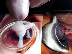 Cumshot a the photo of a wide open pussy by a speculum