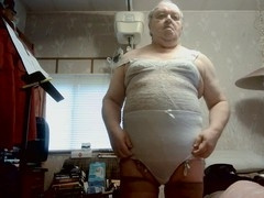 Plump chick from WIENER indulges in some playful tugging and teasing with a small cock