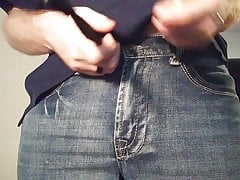 Redhead guy strips and shows us his great cock up close
