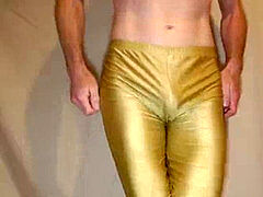12 cumloads pumped into glossy gold lycra cut-offs - devotee request