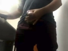 Brazilian Daddy Strokes His Big Uncut Cock at Work