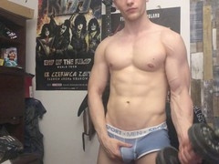 Chris Wild shows off his massive manhood while pumping iron