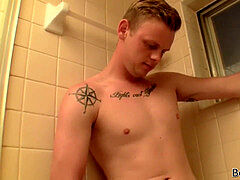 Inked blond Dallas Cage masturbating off youngster peeing solo